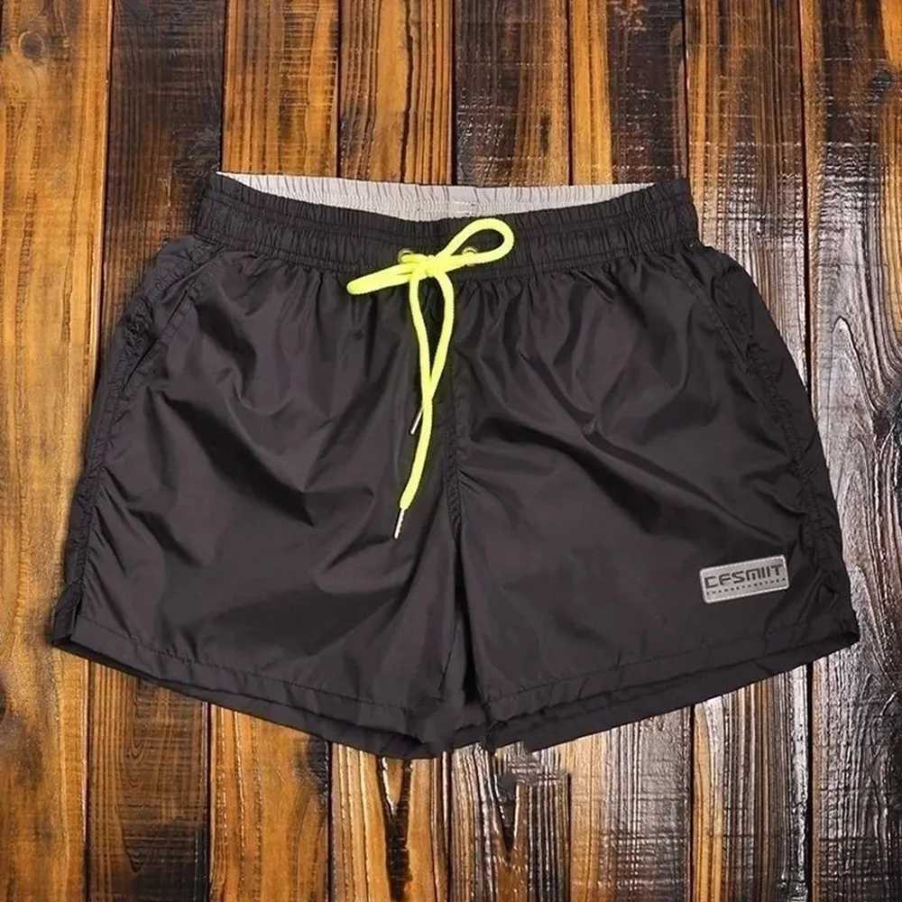 Mens Swimming Trunks Basic Solid Color Sports Fitness Jogging Shorts Quick-Dry Personality Beach Vacation Shorts MenS ClothingT250304
