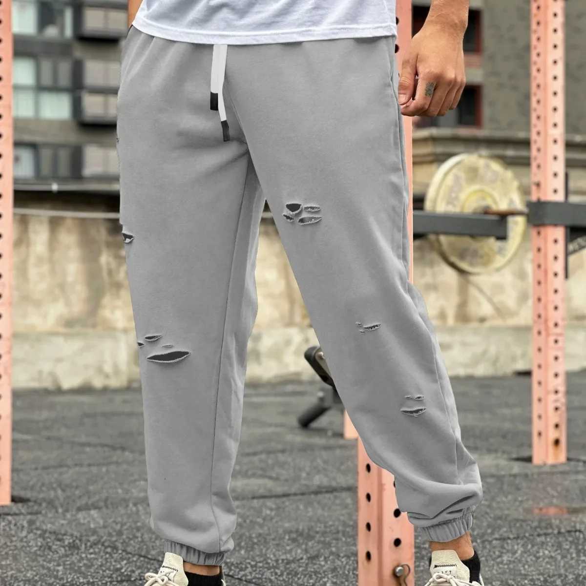 Mens streetwear casual trend cuffs pants jogging drag sports pants tearing Trouser gym fitness bottom mens clothingXJ250303