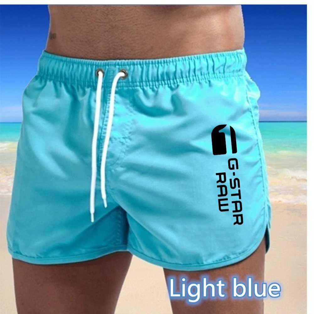 New mens quick drying and breathable beach swimming pants with multi-color printed sports and fitness shorts for external wearT250304