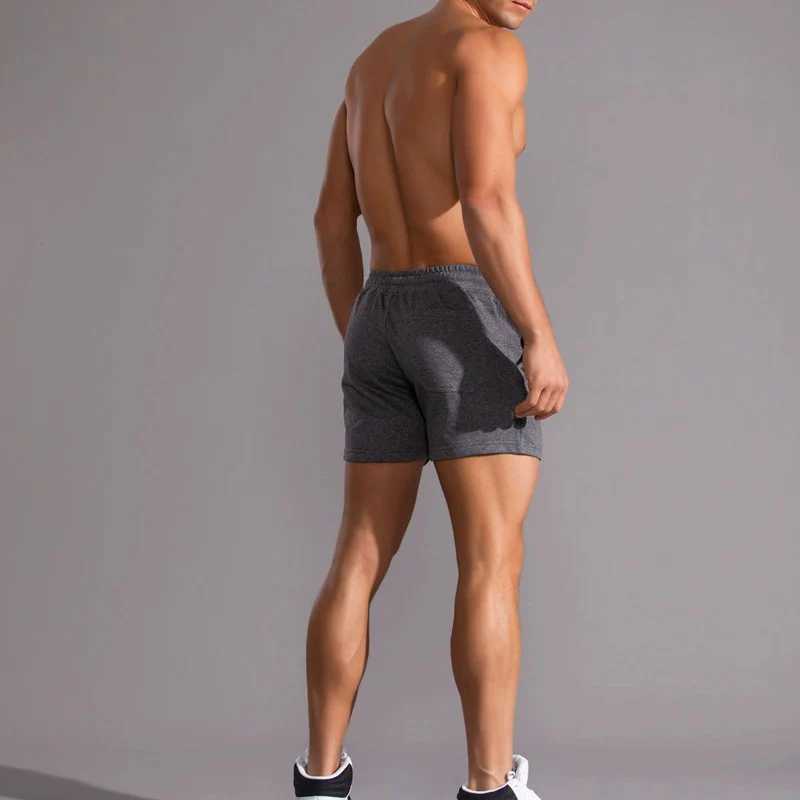 Mens Casual Sports Shorts Summer Breathable Fitness Running Shorts Elastic Solid Color Sports Short Pants Training SportswearT250304