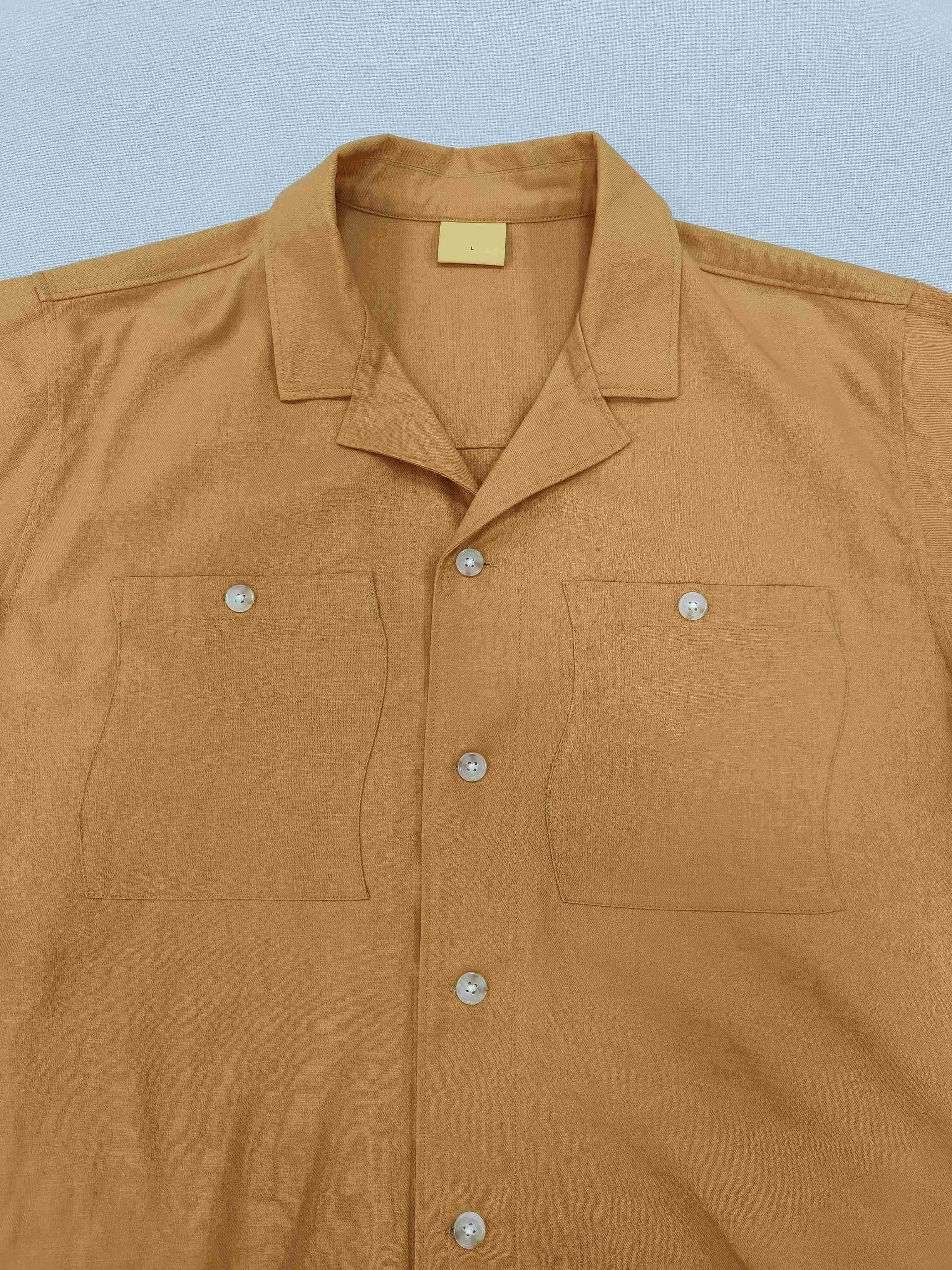 Men's Orange Embroidered Shirt Button closure Logo embroidered at patch pocket Adjustable single-button barrel cuffs 100% cotton Made in China