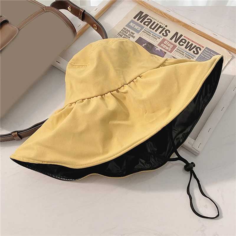 Womens bucket hat summer solid color C Japanese simple folding casual bucket hat vinyl sunscreen and sunscreen bucket hatXJ250304