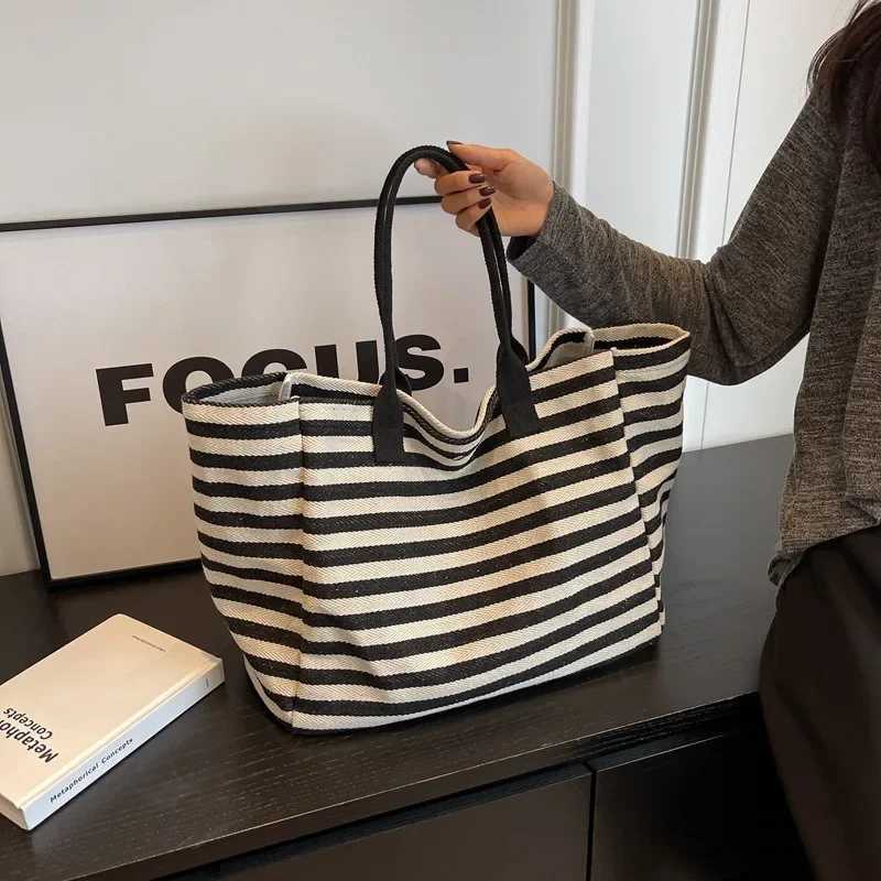 Commuter bag womens fashionable large capacity handbag student striped 2024 new niche zebra canvas single shoulder mom Y250304