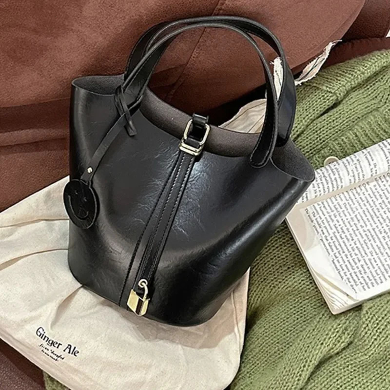 Versatile bag crossbody womens high-end sensory vegetable basket womens bag niche retro bucket bag handbag 250303