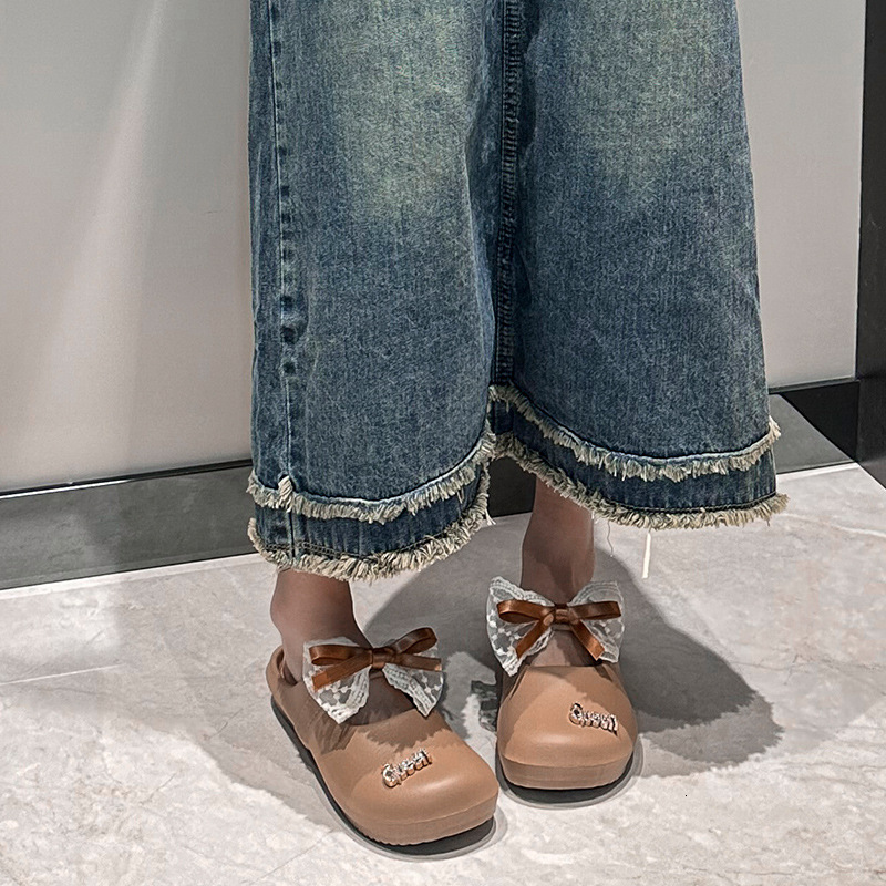 2025 new women's slippers summer bow fashion jacket home EVA stepping on dog poop feeling designer girl cool drag trendy slippers
