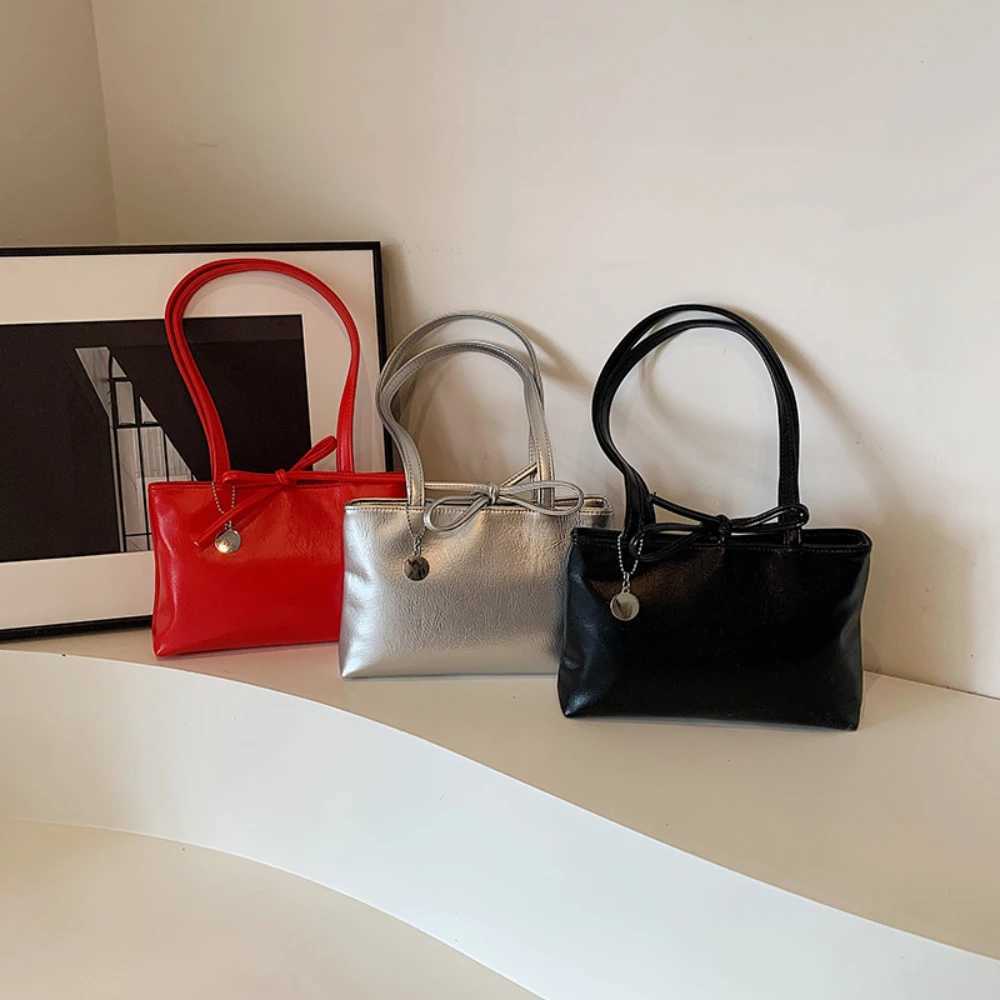 Fashion bow womens shoulder bag silver/black/red zipper handbag Pu leather womens small handbag womens casual handbag Z250303