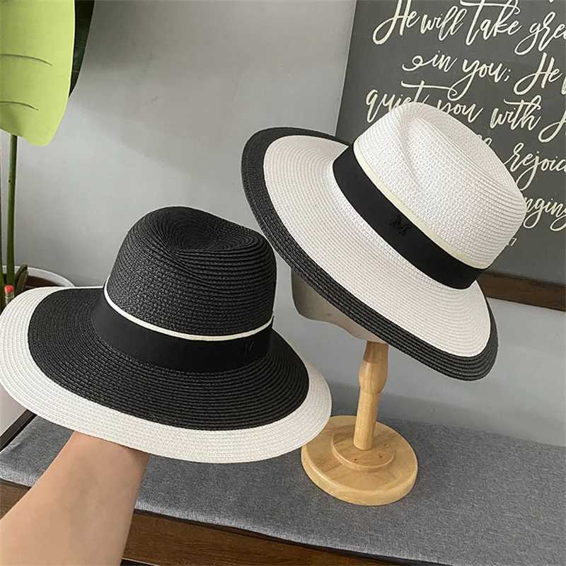 Womens summer flat-top sun hat Fashion hollow vintage str hat Hand-woven summer travel sun hatXJ250304