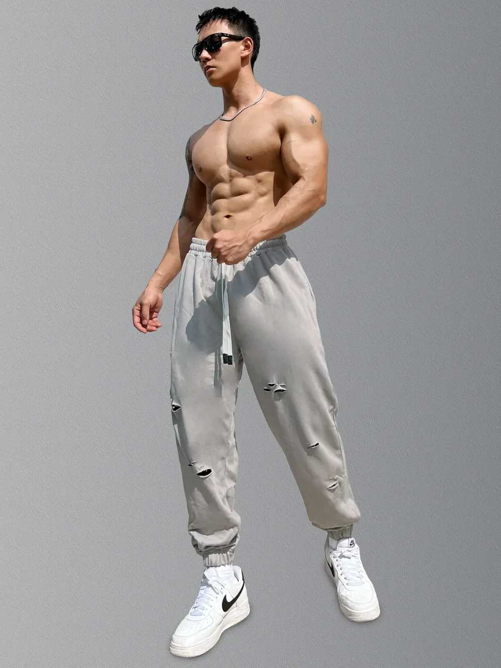 Mens streetwear casual trend cuffs pants jogging drag sports pants tearing Trouser gym fitness bottom mens clothingXJ250303