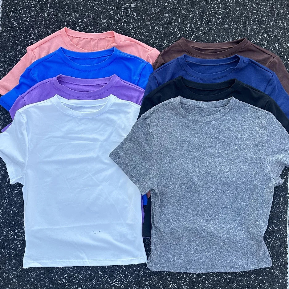 Solid color womens soft breathable yoga short-sleeved comprehensive training tight T-shirt with exposed belly button fitness sh 250303