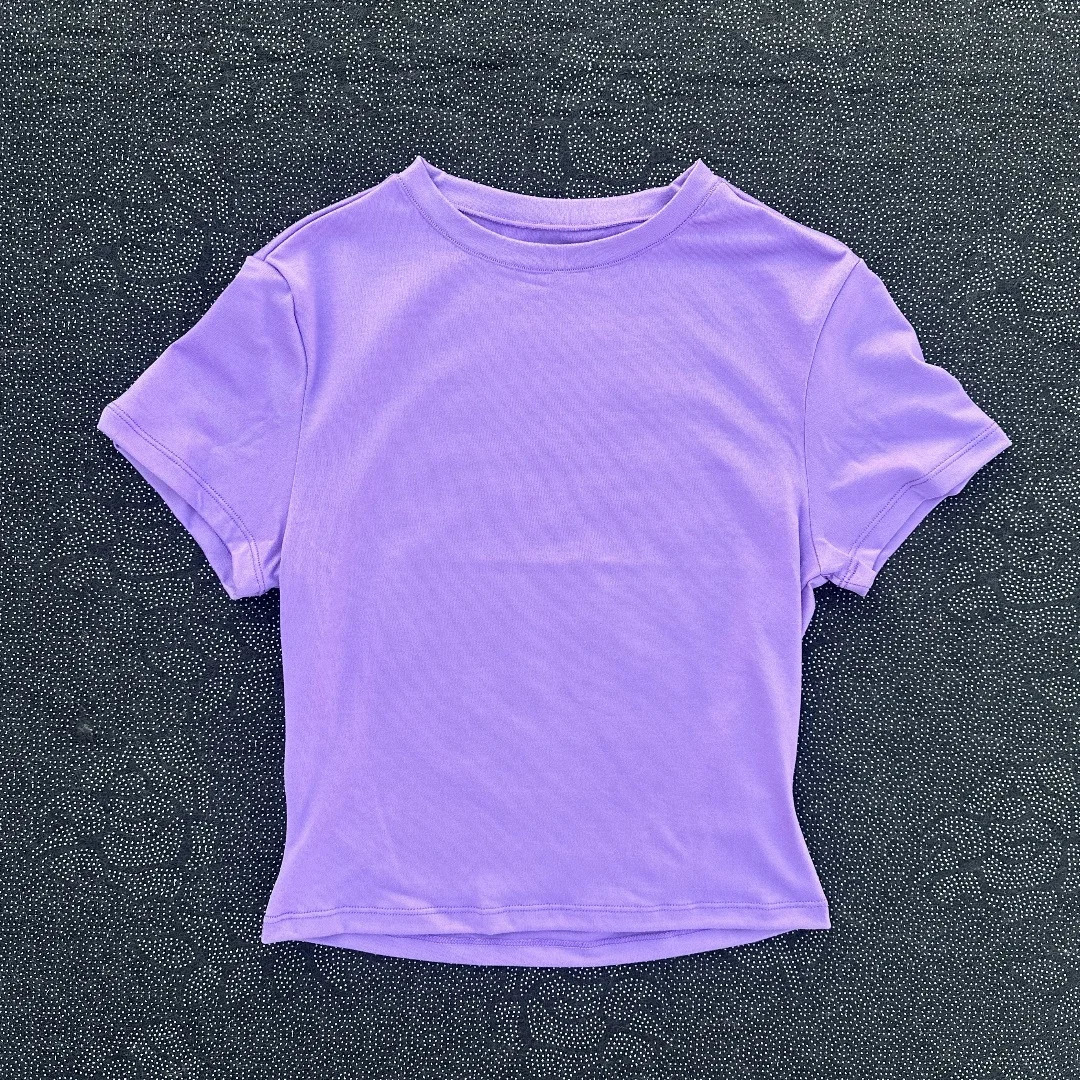 Solid color womens soft breathable yoga short-sleeved comprehensive training tight T-shirt with exposed belly button fitness sh 250303