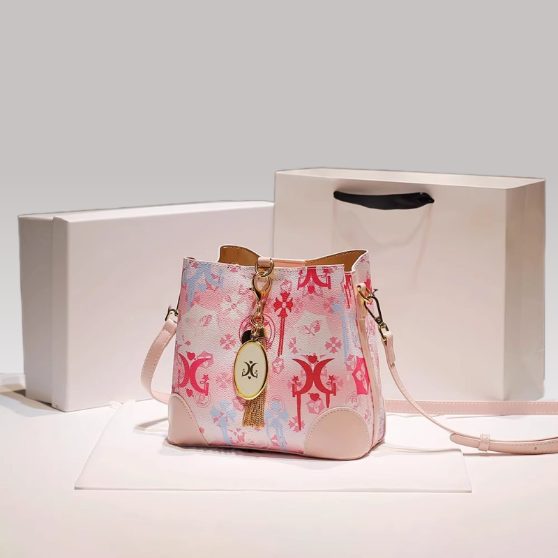 2025 Stylish Bucket Handbag Featuring a Dainty Tassel Pendant and Distinctive Print Pattern crafted from high - quality leather