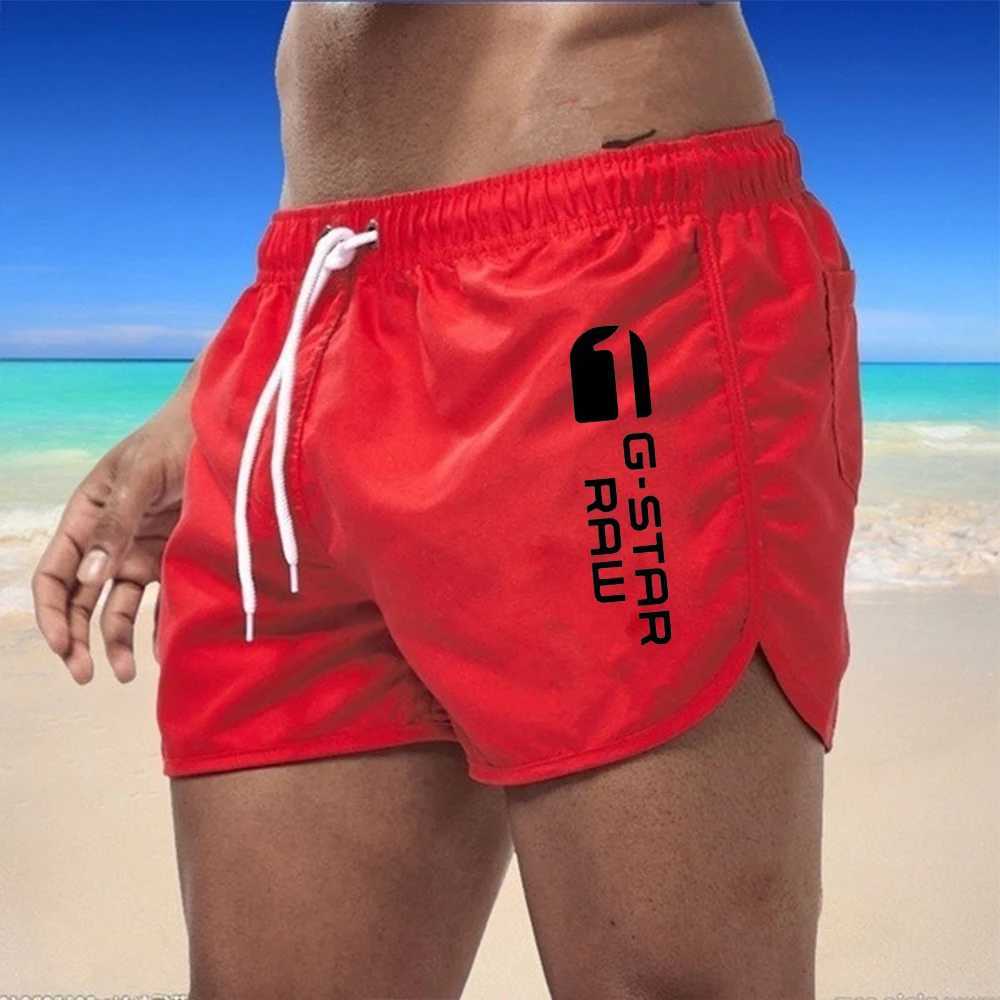 New mens quick drying and breathable beach swimming pants with multi-color printed sports and fitness shorts for external wearT250304