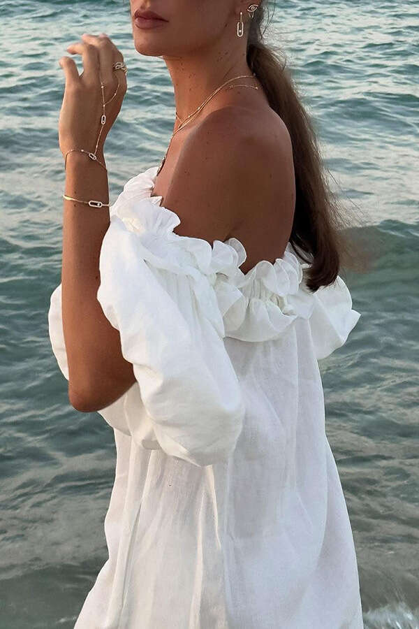 New European American solid color cotton en sexy one neck split vacation dress for women in 2025, with a unique and elegant temperament