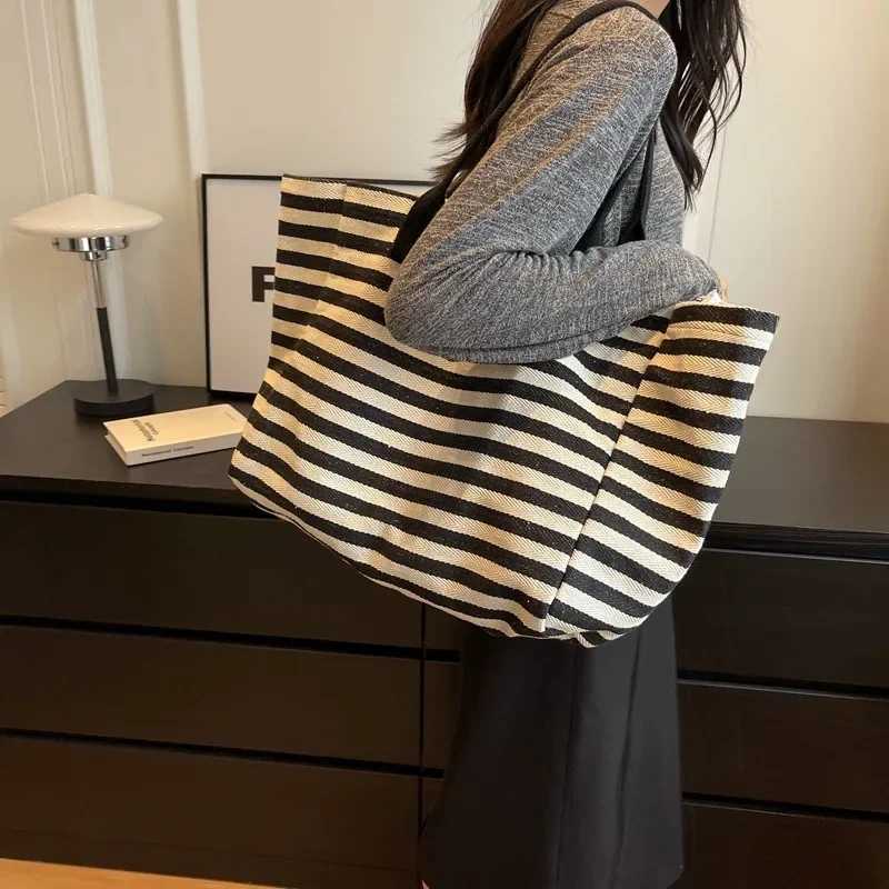 Commuter bag womens fashionable large capacity handbag student striped 2024 new niche zebra canvas single shoulder mom Y250304