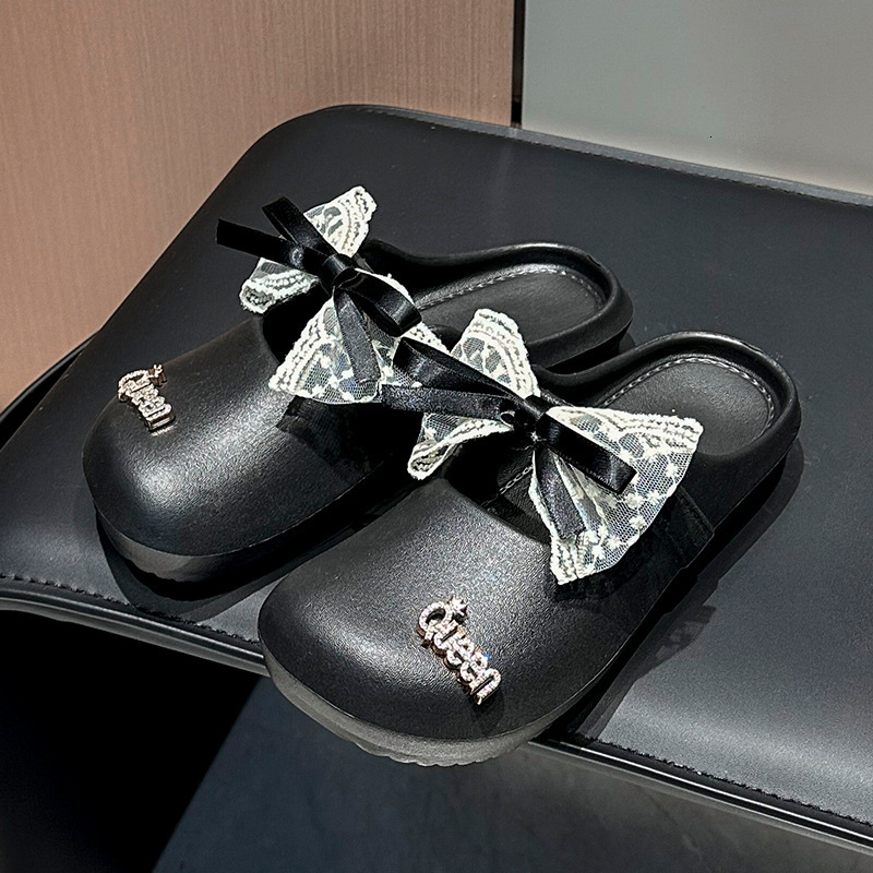2025 new women's slippers summer bow fashion jacket home EVA stepping on dog poop feeling designer girl cool drag trendy slippers