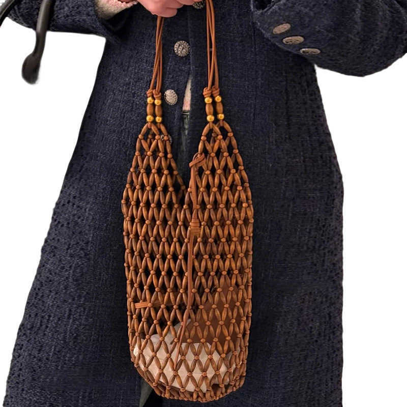 Ins Hollowed Out Handmade Woven Bag, Female Niche Design, Wooden Bead Bucket Bag, Summer Versatile Commuting Single Shoulder Women's Bag 250315