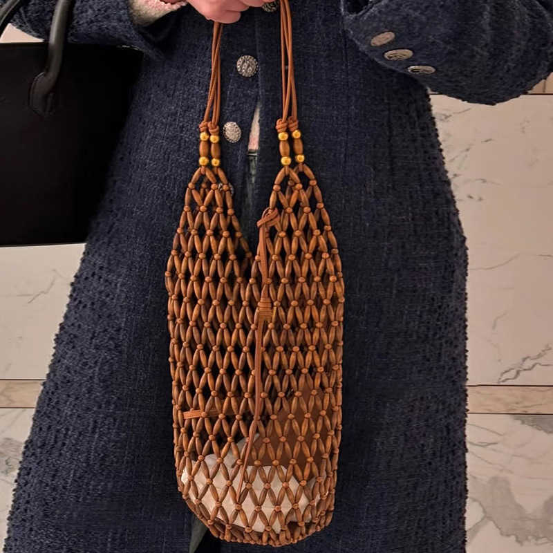 Ins Hollowed Out Handmade Woven Bag, Female Niche Design, Wooden Bead Bucket Bag, Summer Versatile Commuting Single Shoulder Women's Bag 250315