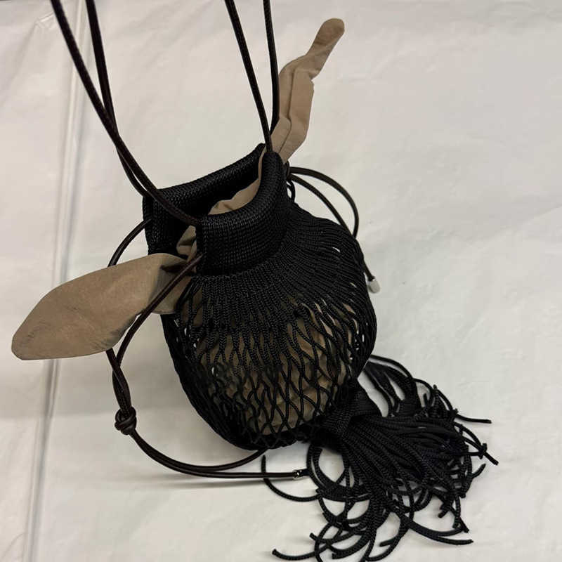 Spring/summer New Niche Design Woven Fishing Net Hollow Woven Lantern Octopus Net Pocket Bag Personalized Women's Bag 250315