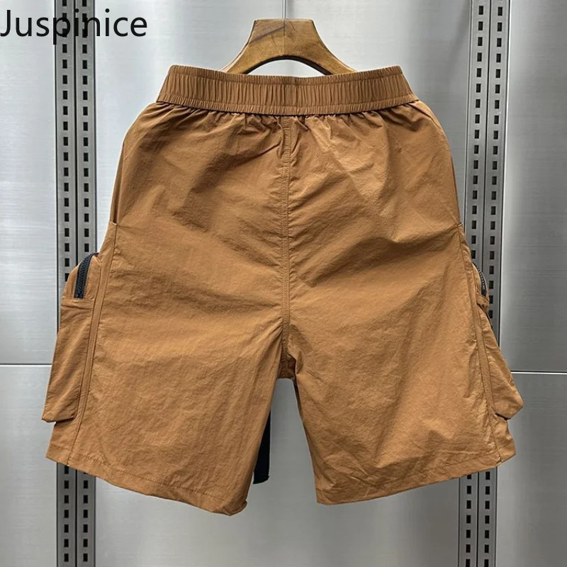 Summer Large Size Multi-pocket Cargo Shorts Couples Outdoor Functional Casual Loose High Street Five-point Pants Male Clothes 250304