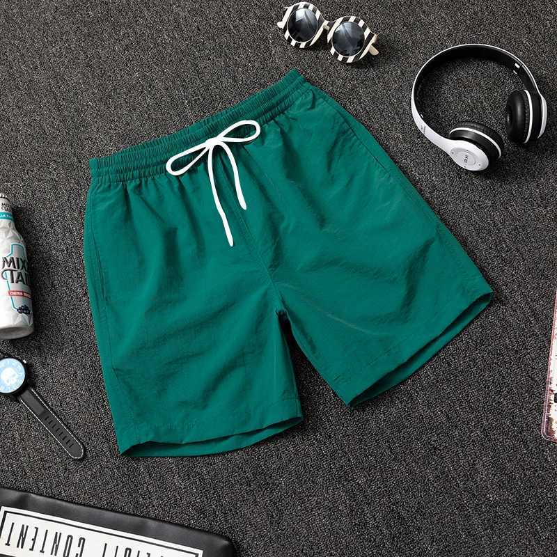 Mens solid color casual sports shorts quick dry surfing beach board elastic waist Bermuda mens surfing shorts size 2XS-6XLXJ250407