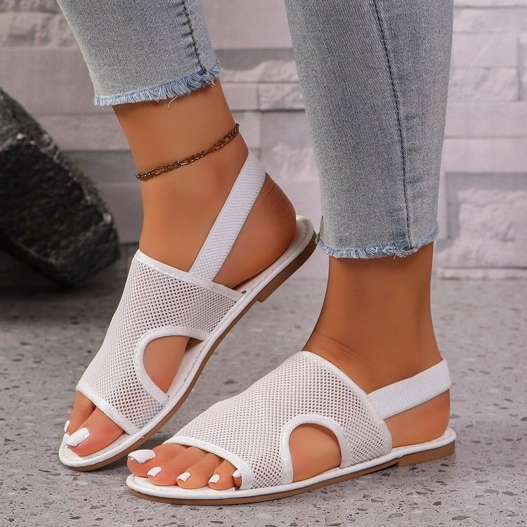 Large mesh belt hollowed out sandals for summer 2025, new flat bottomed round toe beach women's shoes ddmykukumalu