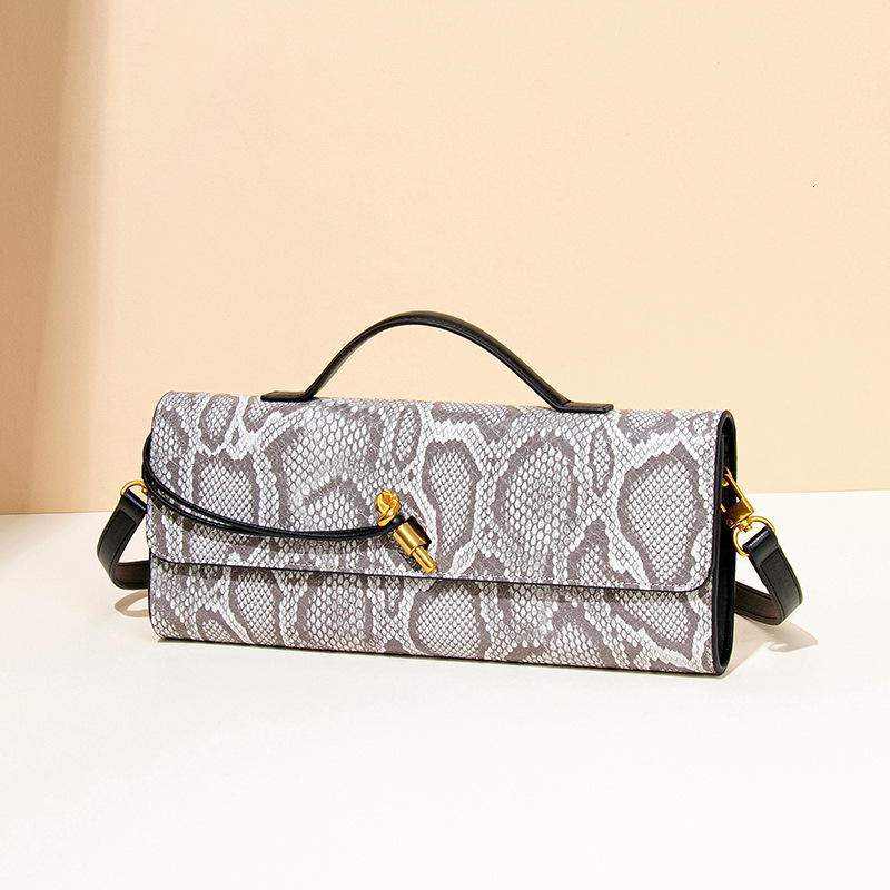 Series 2025 New Women's Light Luxury Elegant Serpentine Handheld Stick High End Banquet designer ladies clutch bags
