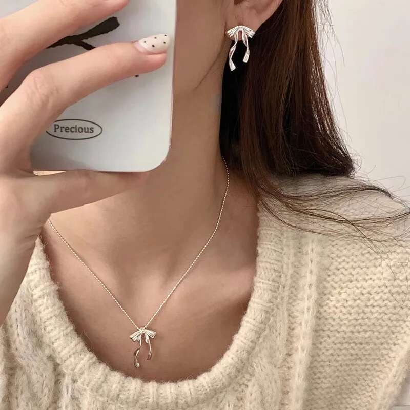 PANJBJ Sterg Sier Bow Knot Earring for Women Texture Tassels Sweet Romantic Korean Jewelry Gift Dropshipping