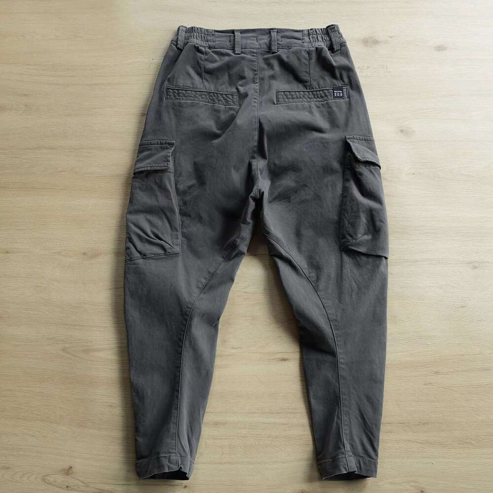 Hot selg European and American men's fashionable multi pocket solid color retro straight tube slim fit elastic waist button work pants 2025 new c
