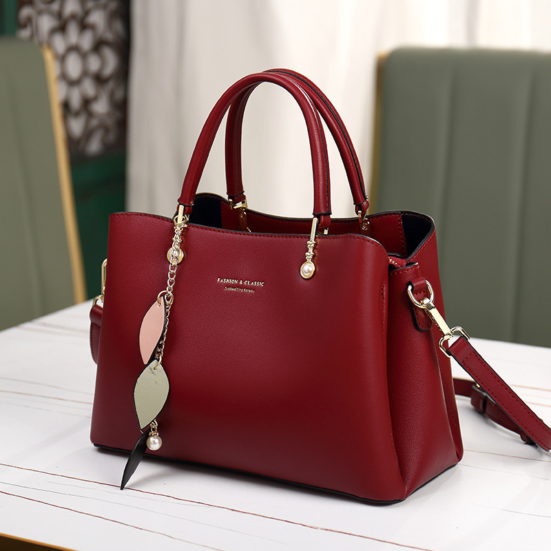 2025 New Women's Lightweight One Shoulder Cross Arm Handheld Commuter Luxury Designer Leather Handbag