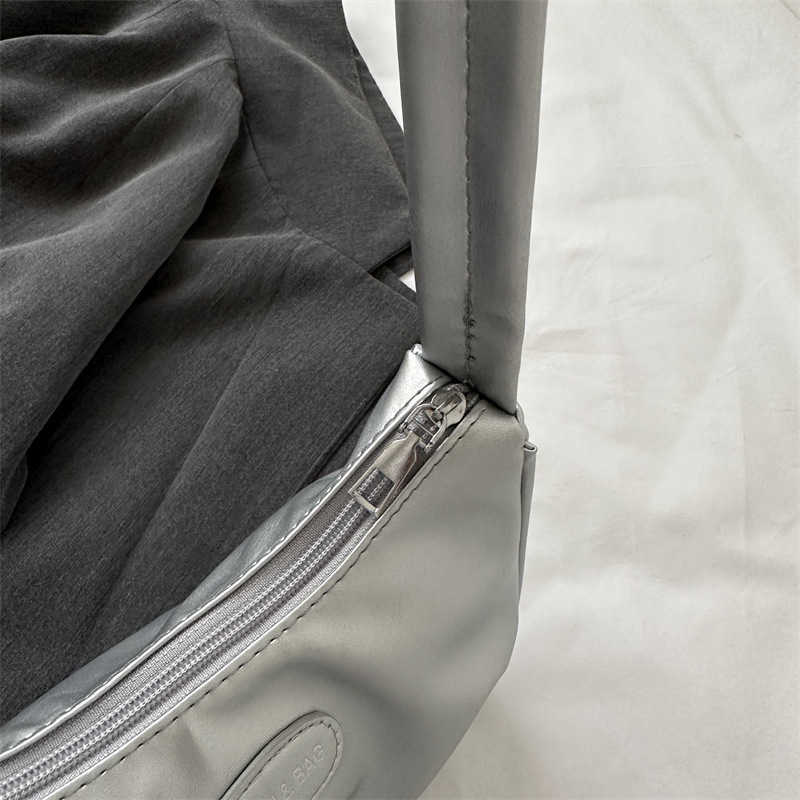 Niche texture silver bag for women 2023 new summer single shoulder crossbody bag high-end pleated armpit crescent bag Y250306