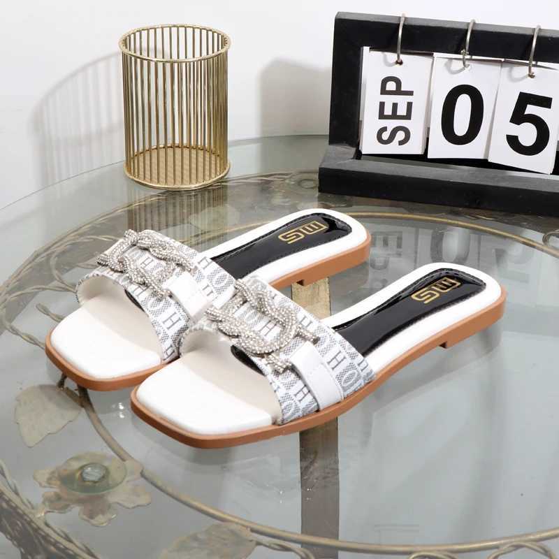 Slippers 2025 new anti-slip rhine flat bott fi word drag wens shoes wear sandals open toe luxurious lady slippers Y250306