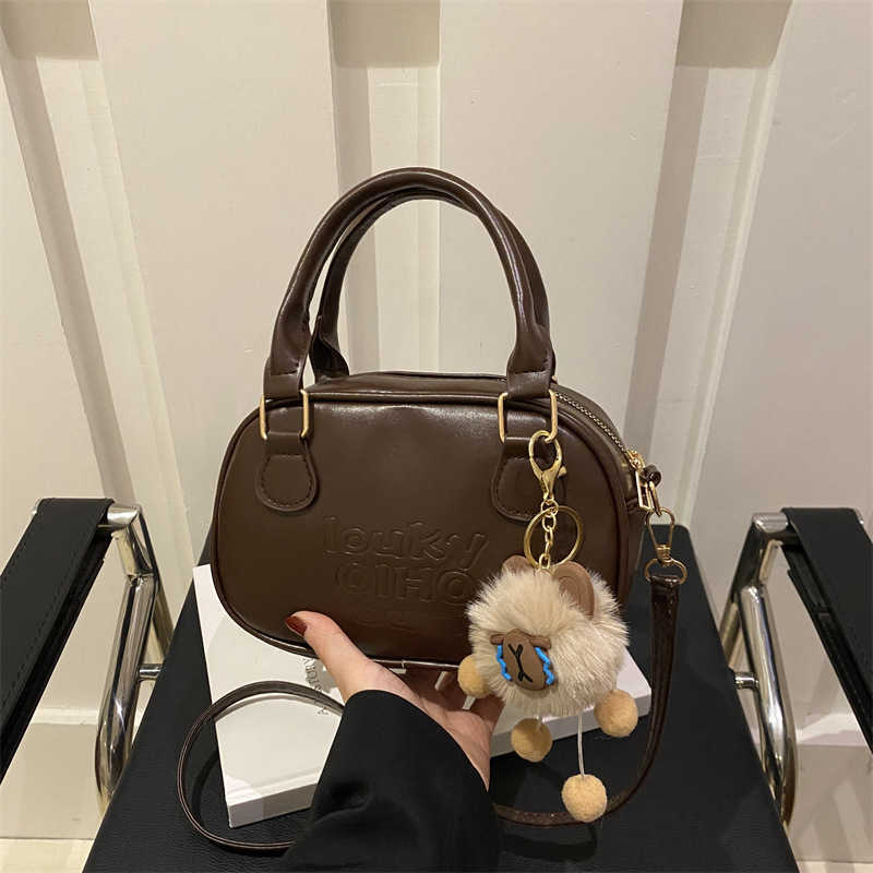 Niche bowling bag for women 2024 new autumn and winter single shoulder crossbody bag high-end texture coffee colored handbag Y250306