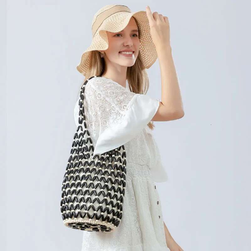 Large Capacity Wooden Bead Women Bucket 2025 New Handmade Woven Shoulder Vacation Beach Bag