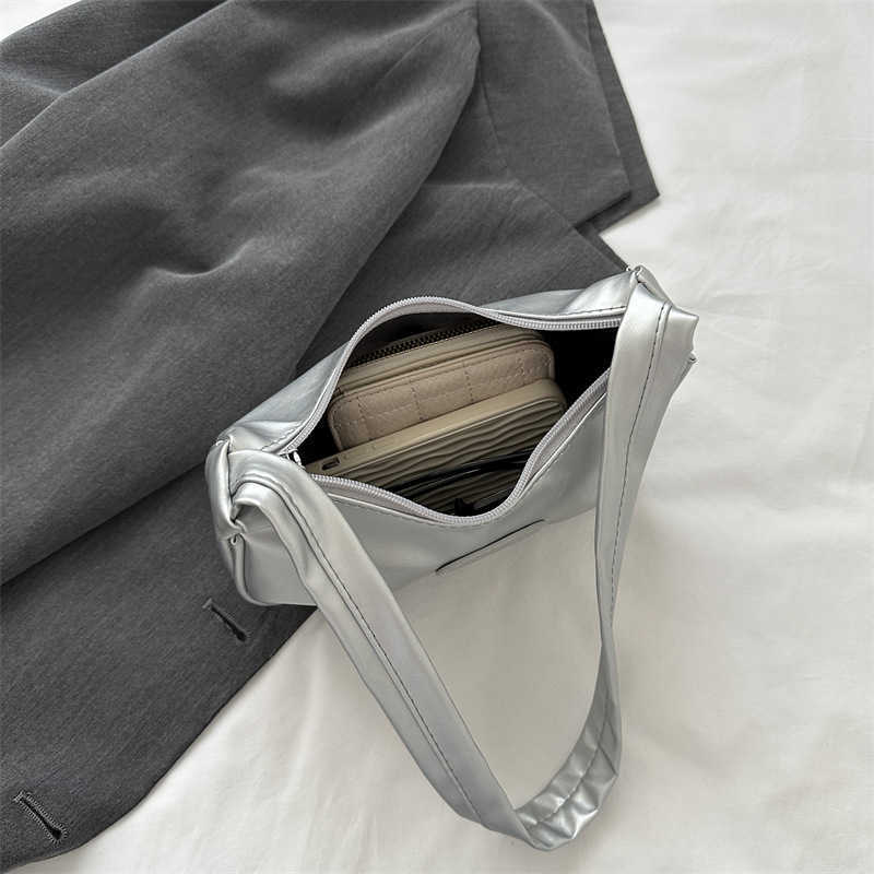 Niche texture silver bag for women 2023 new summer single shoulder crossbody bag high-end pleated armpit crescent bag Y250306