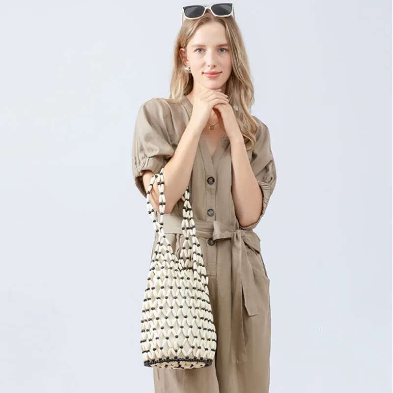 Large Capacity Wooden Bead Women Bucket 2025 New Handmade Woven Shoulder Vacation Beach Bag
