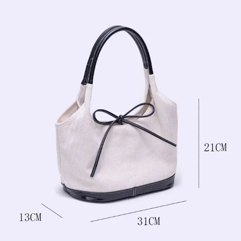 New Large Capacity Bow Bucket Canvas Women 2025 Retro Commuter Shoulder Underarm Tote Bag