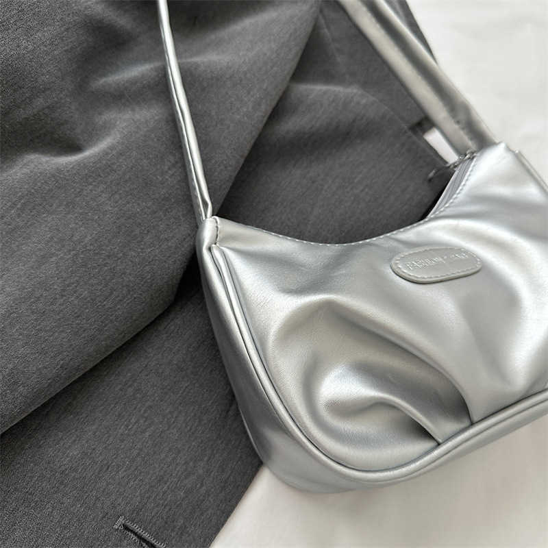 Niche texture silver bag for women 2023 new summer single shoulder crossbody bag high-end pleated armpit crescent bag Y250306