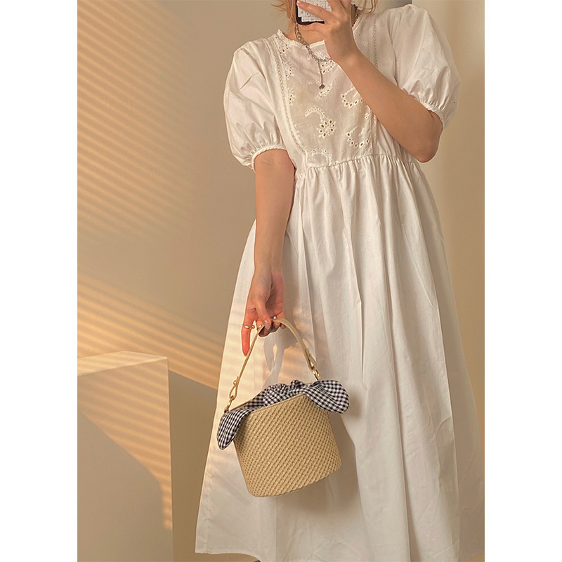Straw woven bucket bag for women in summer 2025 fashionable internet celebrity personalized knotted handbag crossbody woven bag for women 241018