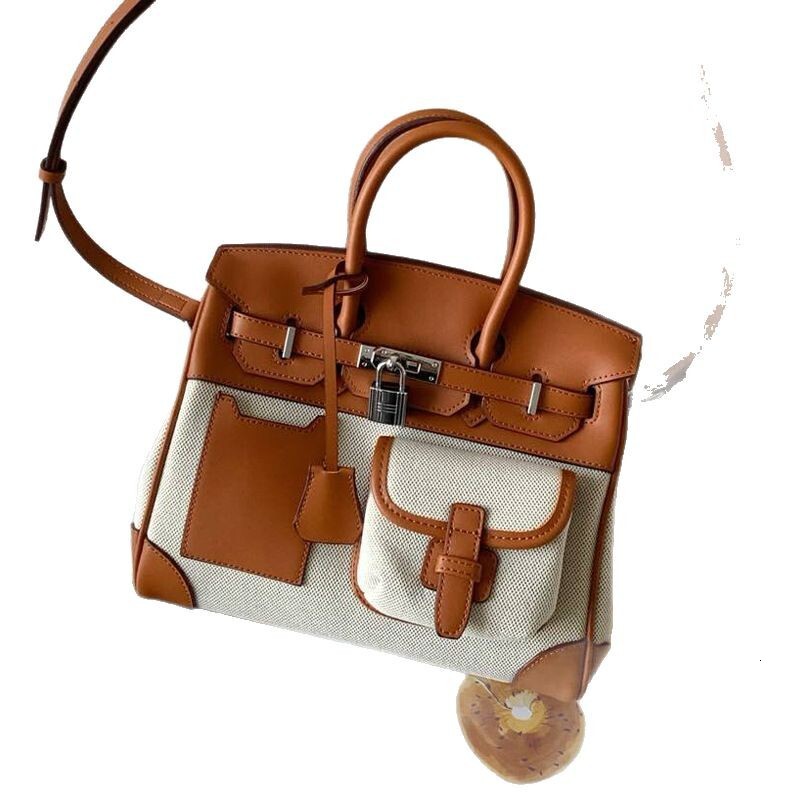 2025 New Color Contrast Canvas Splicing High Quality Leather Large Capacity Handheld Bag Crossbody Bag Senior Designer Women s Fashion Pocket Bag High