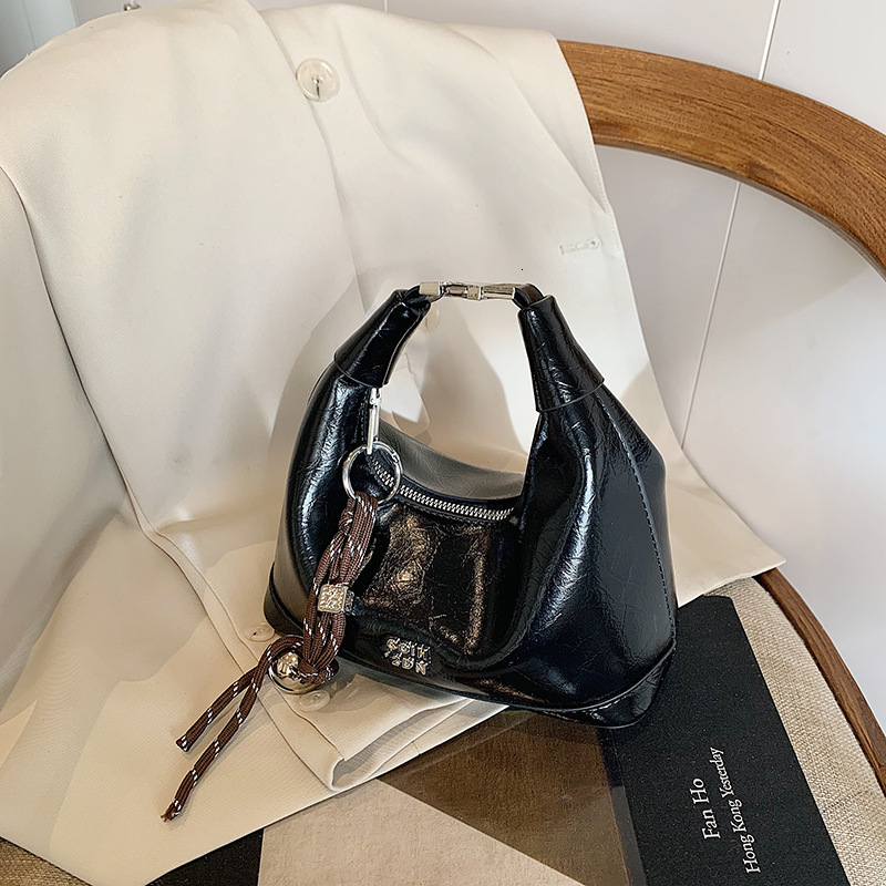 2025 New Handheld Fashion Designer Women s Mini Bag Casual Croissant Niche New High end Style Simple Multifunctional Crossbody Bag Shoulder Bag