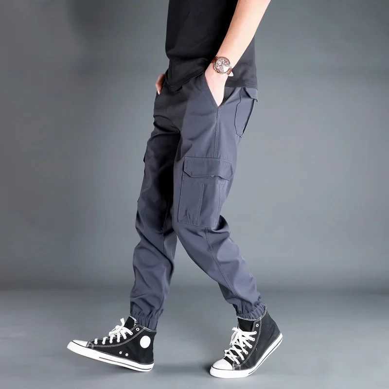 Spring Autumn Stretch Causal Pants Men Military SoftShell Waterproof Outdoor Hiking Cargo Pants Tactical Trousers 6XLT250308