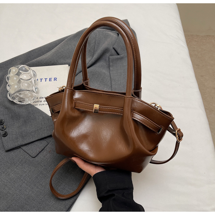 2025 New Niche Designer Women s Hand held Handbag Fashionable High quality PU Tote Bag Suede Leather Pleated Armpit Dumpling Bag Crossbody Bag