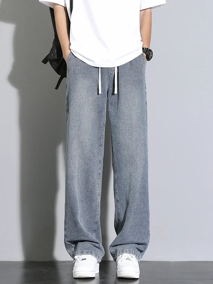 2025 Mens Casual Long Jeans Korean StyleClassic Straight Denim WideLeg Pants Solid Colors Light Blue Grey Black up to 3XL 250305