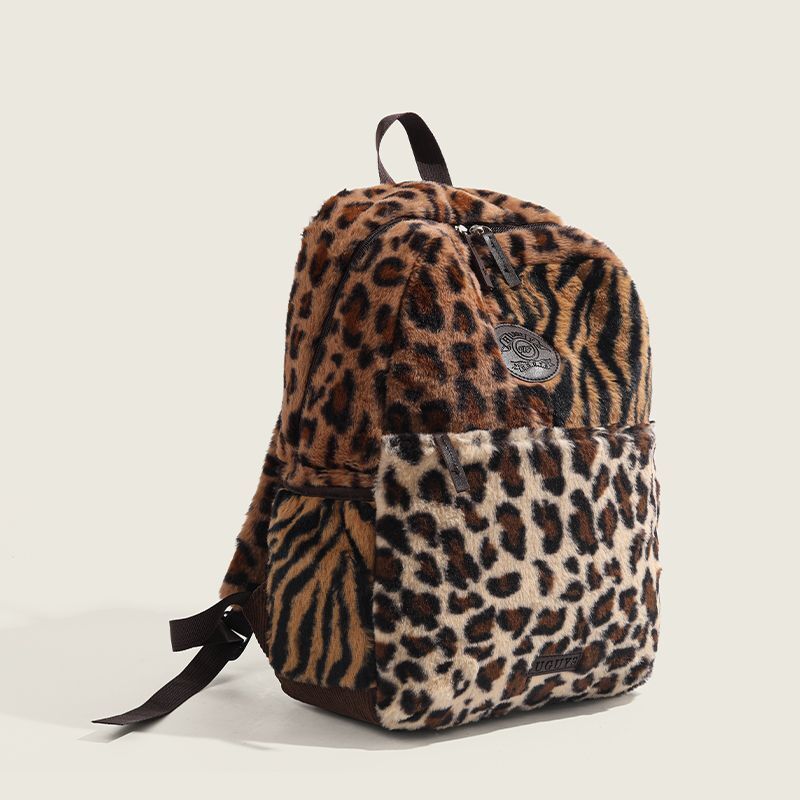 2025S new designer animal leopard print spliced contrasting color plush large capacity versatile travel for male and female students in class backpack