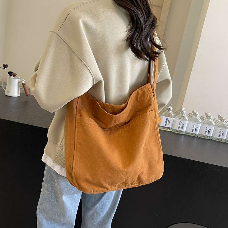 Large capacity leisure commuting bag for women 2024 new simple and fresh shoulder bag high-end canvas tote bag240923