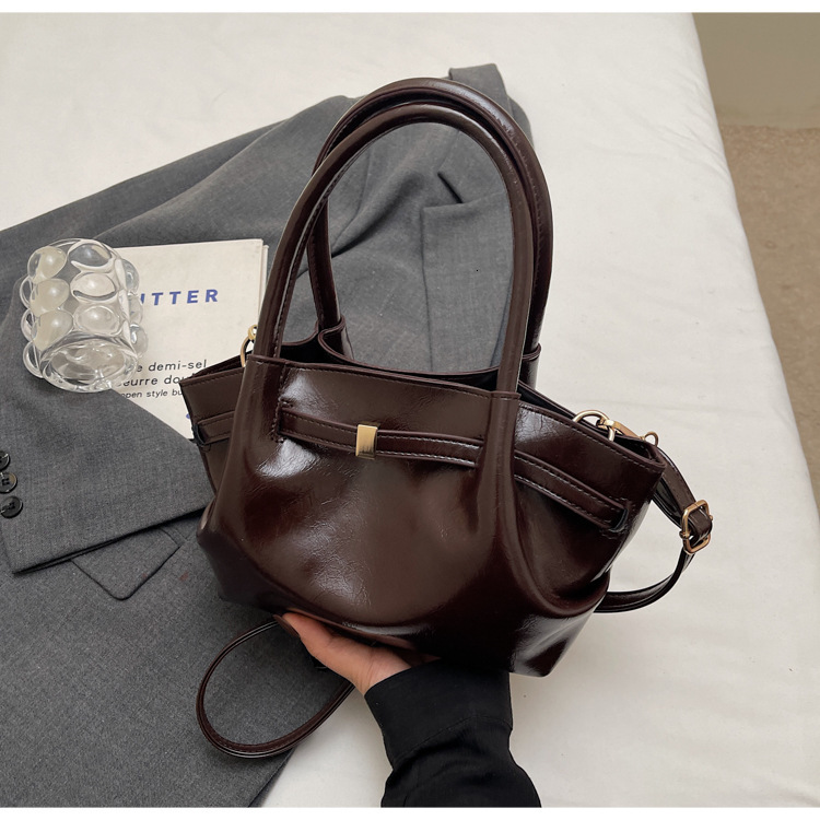 2025 New Niche Designer Women s Hand held Handbag Fashionable High quality PU Tote Bag Suede Leather Pleated Armpit Dumpling Bag Crossbody Bag