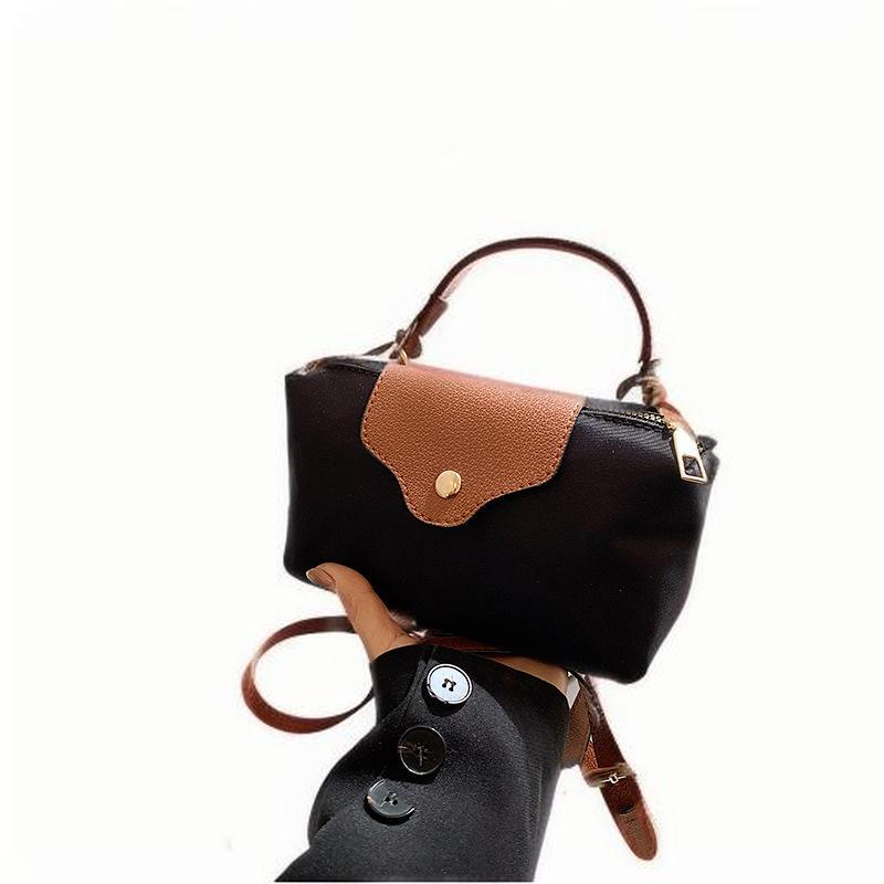 Lightweight simple Oxford cloth shoulder women 2024 new texture niche hot design patchwork crossbody bag