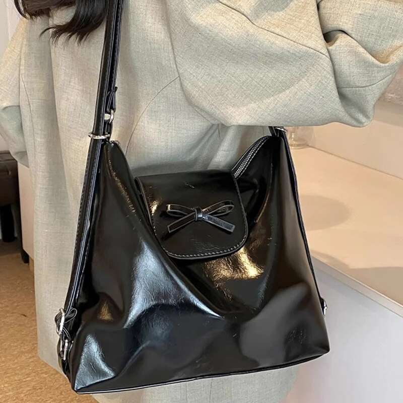 New Retro Red Bow Designer Women s Backpack Trendy trend Large leisure Capacity Commuter Handbag Women s Travel Single Shoulder Cross body Multi funct