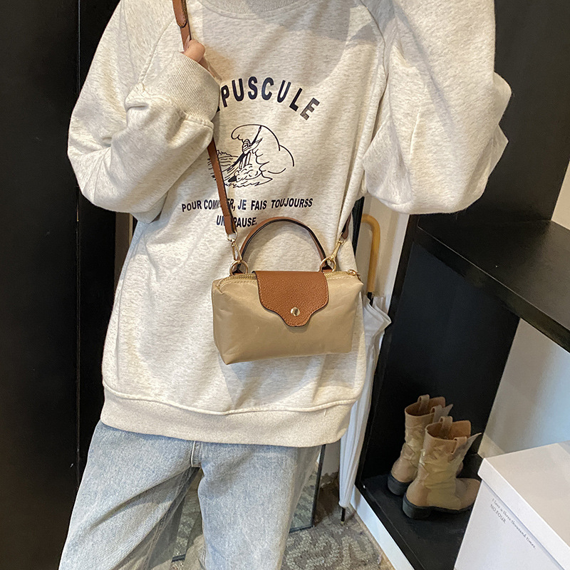 Lightweight simple Oxford cloth shoulder women 2024 new texture niche hot design patchwork crossbody bag