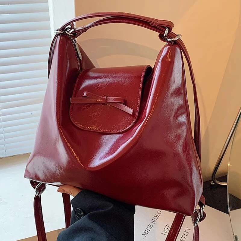 New Retro Red Bow Designer Women s Backpack Trendy trend Large leisure Capacity Commuter Handbag Women s Travel Single Shoulder Cross body Multi funct